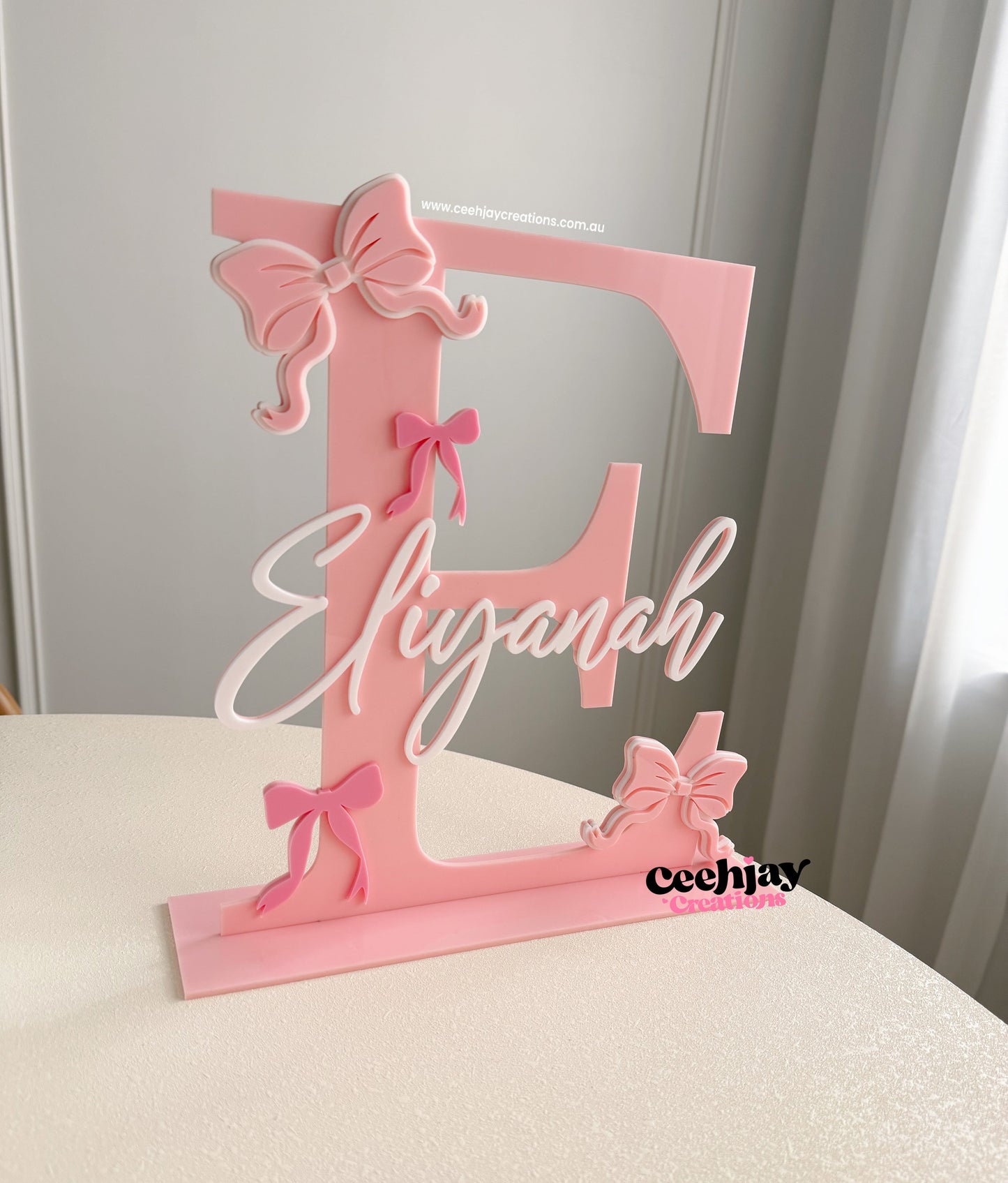 Initial Bow Name Sign